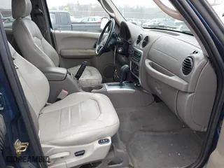 2004 Jeep Liberty Limited with VIN 1J4GL58K34W112569, listed as a IAAI auction lot 42021937 with 181,814 mi miles. Bid and sale history available at carsss.com. Image 5.