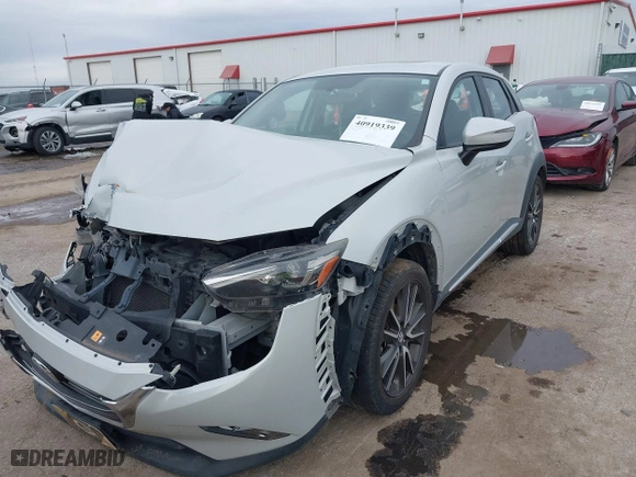 2016 Mazda CX-3 Grand Touring with VIN JM1DKDD78G0134176, listed as a IAAI auction lot 40919339 with NaN miles. Bid and sale history available at carsss.com. Image 20.