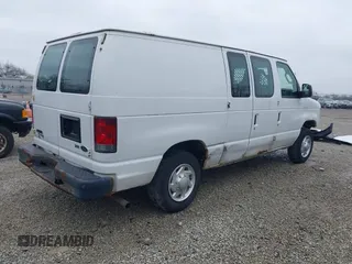 2012 Ford Econoline Cargo Commercial with VIN 1FTNE1EW0CDB10750, listed as a IAAI auction lot 41939696 with 180,042 mi miles. Bid and sale history available at carsss.com. Image 4.