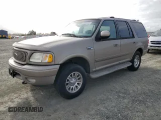 2001 Ford Expedition Eddie Bauer with VIN 1FMPU18L31LB70212, listed as a Copart auction lot 50969355 with 100,311 mi miles and Clean title. Bid and sale history available at DreamBid. Image 1.
