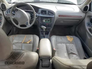 1997 Oldsmobile Cutlass GLS z VIN 1G3NG52M6V6303805, wystawiony jako Copart lot #81500424 z przebiegiem 129 429 mil mil oraz Szkody całkowita. Historia ofert i sprzedaży dostępna na DreamBid. Obrazek 8.