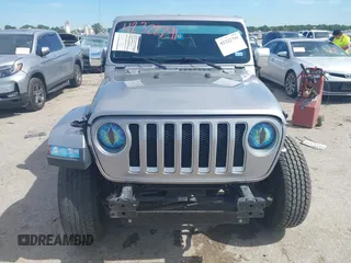 2018 Jeep Wrangler Unlimited Sahara with VIN 1C4HJXEG4JW115522, listed as a IAAI auction lot 42322791 with 68,409 mi miles and . Bid and sale history available at DreamBid. Image 12.