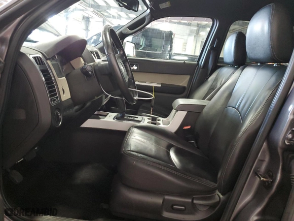 2010 Mercury Mariner Premier with VIN 4M2CN9H70AKJ24788, listed as a Copart auction lot 63035164 with 153,957 mi miles and Salvage Title. Bid and sale history available at carsss.com. Image 7.
