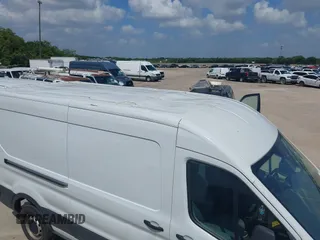 2019 Ford Transit with VIN 1FTBW2CM2KKB73009, listed as a IAAI auction lot 42739561 with 144,807 mi miles and . Bid and sale history available at DreamBid. Image 6.