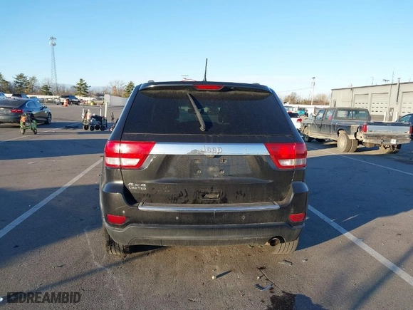 2012 Jeep Grand Cherokee Limited with VIN 1C4RJFBG2CC332218, listed as a IAAI auction lot 41029135 with 198,675 mi miles. Bid and sale history available at carsss.com. Image 17.