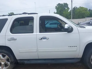 2013 Chevrolet Tahoe LS with VIN 1GNSCAE01DR260799, listed as a IAAI auction lot 42496680 with 199,276 mi miles and . Bid and sale history available at DreamBid. Image 14.