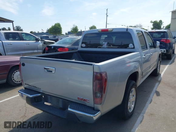 2010 GMC Canyon SLE1 with VIN 1GTDSCDEXA8138621, listed as a IAAI auction lot 42042749 with 169,354 mi miles. Bid and sale history available at carsss.com. Image 4.