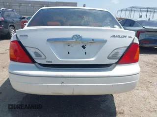 2001 Toyota Avalon XL z VIN 4T1BF28B91U183347, wystawiony jako IAAI lot #42441956 z przebiegiem 310 167 mil mil oraz . Historia ofert i sprzedaży dostępna na DreamBid. Obrazek 16.