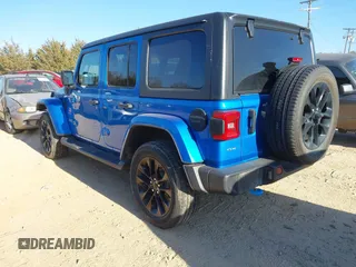 2022 Jeep Wrangler Unlimited Sahara z VIN 1C4JJXP64NW192452, wystawiony jako IAAI lot #41631295 z przebiegiem 23 738 mil mil oraz . Historia ofert i sprzedaży dostępna na DreamBid. Obrazek 3.