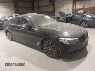 2018 BMW 5 Series 530i xDrive with VIN WBAJA7C58JG908252, listed as a IAAI auction lot 40872157 with 80,590 mi miles. Bid and sale history available at carsss.com. Image 1.