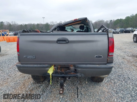 2003 Ford F-350 XL with VIN 1FTSX31F63EB09868, listed as a IAAI auction lot 41794191 with 124,074 mi miles and . Bid and sale history available at DreamBid. Image 16.