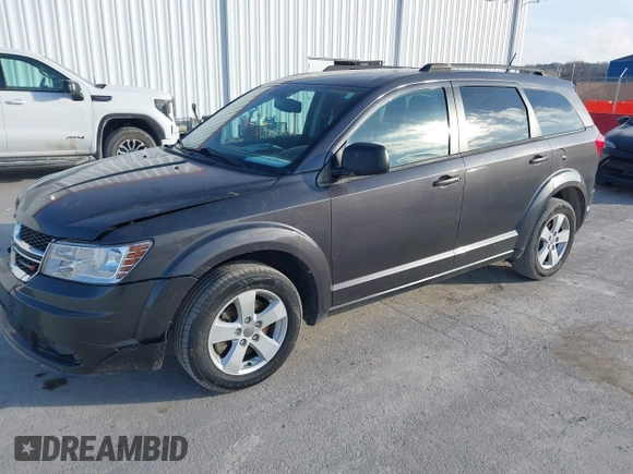 2014 Dodge Journey SE with VIN 3C4PDCAB0ET283756, listed as a IAAI auction lot 41490472 with 122,695 mi miles. Bid and sale history available at carsss.com. Image 18.