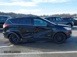 2013 Ford Escape SE with VIN 1FMCU9GX9DUB92246, listed as a IAAI auction lot 41808372 with 73,472 mi miles. Bid and sale history available at carsss.com. Image 13.