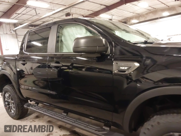 2023 Ford Ranger XL with VIN 1FTER4FH8PLE17858, listed as a IAAI auction lot 41710721 with 5,299 mi miles and . Bid and sale history available at DreamBid. Image 13.