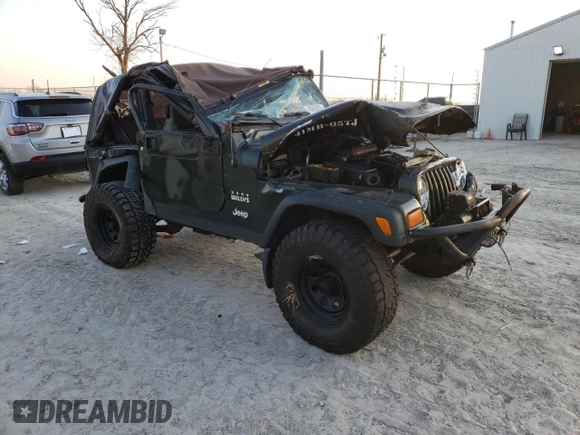 2005 Jeep Wrangler X with VIN 1J4FA39S75P308465, listed as a Copart auction lot 48693035 with Not Provided miles and Salvage Title. Bid and sale history available at DreamBid. Image 4.