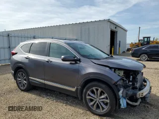 2020 Honda CR-V Touring with VIN 2HKRW2H99LH677964, listed as a Copart auction lot 61169915 with 65,915 mi miles and Salvage title. Bid and sale history available at DreamBid. Image 4.
