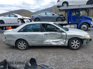 2002 Toyota Avalon XL with VIN 4T1BF28B12U234616, listed as a IAAI auction lot 41954288 with 148,418 mi miles. Bid and sale history available at carsss.com. Image 13.