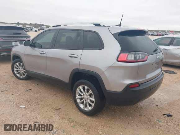2021 Jeep Cherokee Latitude with VIN 1C4PJLCB7MD134643, listed as a IAAI auction lot 40922669 with 58,217 mi miles. Bid and sale history available at carsss.com. Image 3.