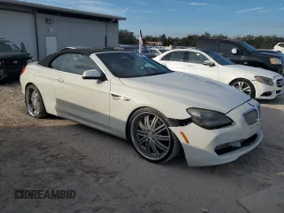 2012 BMW 6 Series 650i z VIN WBALZ3C56CDL72058, wystawiony jako Copart lot #43246815 z przebiegiem 133 048 mil mil oraz Tytuł czysty. Historia ofert i sprzedaży dostępna na DreamBid. Obrazek 4.