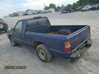 1995 Mitsubishi Mighty Max z VIN JA7LS21G4SP002839, wystawiony jako Copart lot #55777674 z przebiegiem Nie podano mil oraz Tytuł czysty. Historia ofert i sprzedaży dostępna na DreamBid. Obrazek 2.