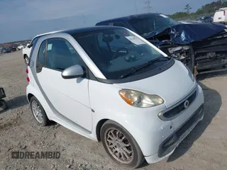 2013 Smart fortwo Passion with VIN WMEEJ9AA9DK716695, listed as a IAAI auction lot 42120327 with Not provided miles and . Bid and sale history available at DreamBid. Image 1.