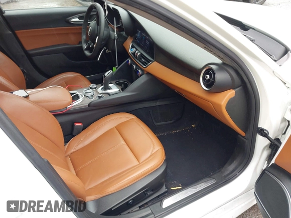 2021 Alfa Romeo Giulia Ti Sport with VIN ZARFAMBN9M7640461, listed as a IAAI auction lot 42329442 with 43,266 mi miles and . Bid and sale history available at DreamBid. Image 5.