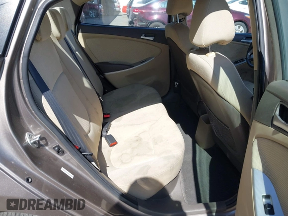 2014 Hyundai Accent GLS z VIN KMHCT4AE9EU671748, wystawiony jako IAAI lot #42356469 z przebiegiem 179 390 mil mil oraz . Historia ofert i sprzedaży dostępna na DreamBid. Obrazek 8.