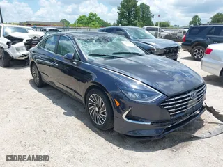 2021 Hyundai Sonata Hybrid SEL with VIN KMHL34JJ5MA026656, listed as a IAAI auction lot 39679569 with 28,005 mi miles. Bid and sale history available at carsss.com. Image 1.