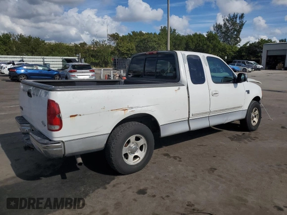 2000 Ford F-150 XL with VIN 1FTRX17W2YNB05575, listed as a Copart auction lot 86606934 with 0 mi miles and Salvage Title. Bid and sale history available at carsss.com. Image 3.