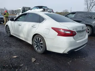 2018 Nissan Altima 2.5 SV with VIN 1N4AL3AP7JC188336, listed as a IAAI auction lot 41460697 with 158,008 mi miles. Bid and sale history available at carsss.com. Image 3.