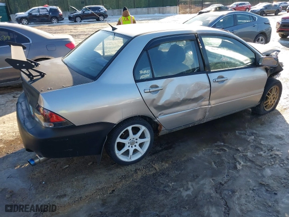2006 Mitsubishi Lancer OZ-Rally with VIN JA3AJ86E56U000207, listed as a IAAI auction lot 41401698 with 239,219 mi miles. Bid and sale history available at carsss.com. Image 4.
