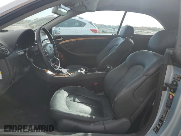 2005 Mercedes-Benz CLK 320 with VIN WDBTK65G65T052026, listed as a Copart auction lot 52526945 with 188,859 mi miles and Salvage Title. Bid and sale history available at DreamBid. Image 7.