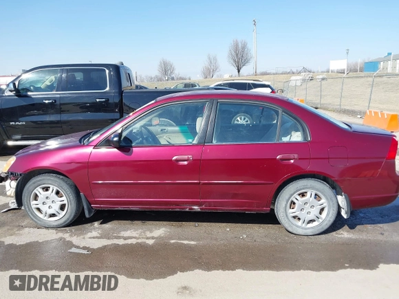 2002 Honda Civic LX with VIN 1HGES16532L017354, listed as a IAAI auction lot 41762516 with 239,122 mi miles and . Bid and sale history available at DreamBid. Image 15.