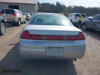 2001 Honda Accord Cpe EX with VIN 1HGCG31571A005892, listed as a IAAI auction lot 42022588 with 202,497 mi miles. Bid and sale history available at carsss.com. Image 17.