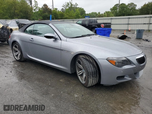 2007 BMW 6 Series M6 z VIN WBSEK93537CS32914, wystawiony jako Copart lot #59816795 z przebiegiem 82 046 mil mil oraz Czysty tytuł • Clean title. Historia ofert i sprzedaży dostępna na DreamBid. Obrazek 4.