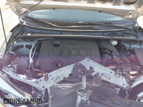 2014 Toyota Corolla L with VIN 2T1BURHE1EC081542, listed as a IAAI auction lot 42124018 with 94,099 mi miles and . Bid and sale history available at DreamBid. Image 10.