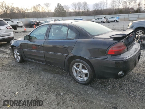 2001 Pontiac Grand Am GT with VIN 1G2NW52E61C212612, listed as a Copart auction lot 48007425 with 182,966 mi miles and Salvage Title. Bid and sale history available at carsss.com. Image 2.