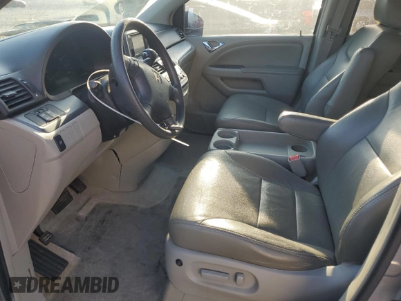 2006 Honda Odyssey EX with VIN 5FNRL38486B091892, listed as a Copart auction lot 53134035 with 154,449 mi miles and Salvage title. Bid and sale history available at DreamBid. Image 7.