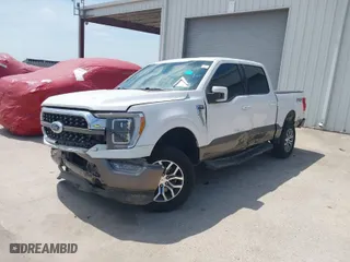 2021 Ford F-150 XL with VIN 1FTFW1E54MKD04591, listed as a IAAI auction lot 38292448 with 77,184 mi miles. Bid and sale history available at carsss.com. Image 2.