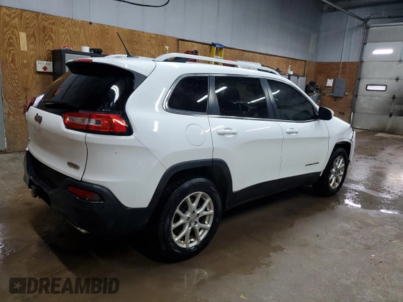 2015 Jeep Cherokee Latitude z VIN 1C4PJMCS1FW520214, wystawiony jako Copart lot #58064705 z przebiegiem 98 602 mil mil oraz Czysty tytuł • Clean title. Historia ofert i sprzedaży dostępna na DreamBid. Obrazek 3.