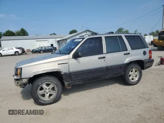 1994 Jeep Grand Cherokee Limited z VIN 1J4GZ78S1RC206288, wystawiony jako Copart lot #62392685 z przebiegiem 207 731 mil mil oraz Szkoda całkowita • Salvage title. Historia ofert i sprzedaży dostępna na DreamBid. Obrazek 1.
