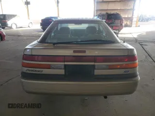 1989 Ford Probe z VIN 1ZVBT21C8K5178908, wystawiony jako Copart lot #87082684 z przebiegiem 84 344 mil mil oraz Tytuł czysty. Historia ofert i sprzedaży dostępna na DreamBid. Obrazek 6.