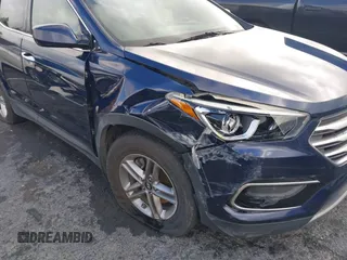 2017 Hyundai Santa Fe 2.4L z VIN 5XYZT3LB1HG489625, wystawiony jako IAAI lot #41784791 z przebiegiem 95 435 mil mil oraz . Historia ofert i sprzedaży dostępna na DreamBid. Obrazek 6.