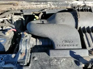 2002 Ford Econoline Cargo z VIN 1FTNE24292HA51435, wystawiony jako Copart lot #87125034 z przebiegiem 105 311 mil mil oraz Nie do naprawy • Non repairable. Historia ofert i sprzedaży dostępna na DreamBid. Obrazek 13.