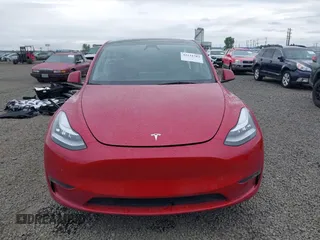 2023 Tesla Model Y Long Range with VIN 7SAYGDEE9PA145947, listed as a IAAI auction lot 42131783 with 4,956 mi miles and . Bid and sale history available at DreamBid. Image 13.