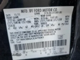 2012 Ford F-350 XL with VIN 1FT8W3B62CEA75083, listed as a Copart auction lot 74129604 with 99,096 mi miles and Salvage title. Bid and sale history available at DreamBid. Image 14.