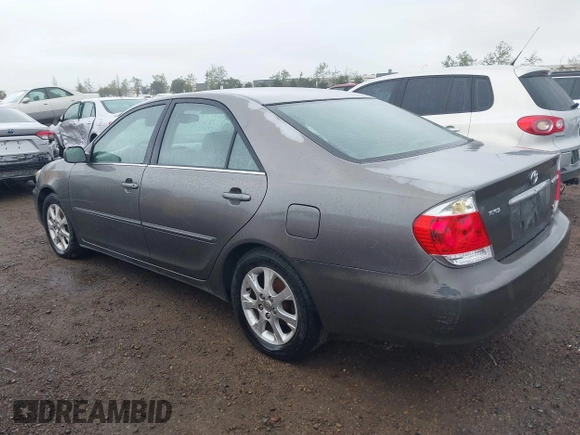 2005 Toyota Camry LE with VIN 4T1BF32K25U595176, listed as a IAAI auction lot 41932171 with 203,956 mi miles and . Bid and sale history available at DreamBid. Image 3.