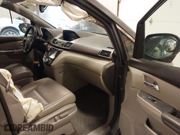 2014 Honda Odyssey EX-L with VIN 5FNRL5H67EB056983, listed as a IAAI auction lot 42318699 with 256,267 mi miles and . Bid and sale history available at DreamBid. Image 5.