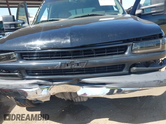 2003 Chevrolet Tahoe LS z VIN 1GNEC13T53J331221, wystawiony jako IAAI lot #42422243 z przebiegiem Nie podano mil oraz . Historia ofert i sprzedaży dostępna na DreamBid. Obrazek 6.