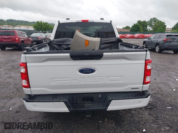 2023 Ford F-150 XL with VIN 1FTEW1EP5PFB87582, listed as a IAAI auction lot 42254015 with 10,476 mi miles and . Bid and sale history available at DreamBid. Image 16.